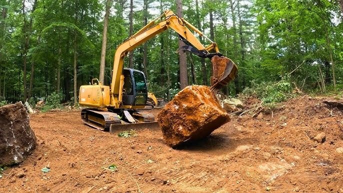 Ein 40-Tonnen-Bagger krachte auf etwas Vergrabenes – was darin gefroren war, ließ die Arbeiter verstummen